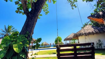 Habitación Confort, vista a la playa | Terraza o patio