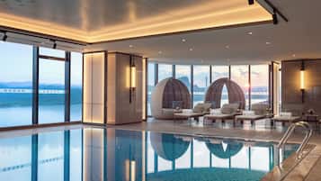 Indoor pool, open 7:00 AM to 10:30 PM, sun loungers, lifeguards on site