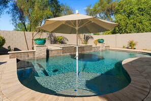 Outdoor pool, a heated pool - Private Heated Pool & Spa - Modern, Spotless Desert Home (San Tan Valley)