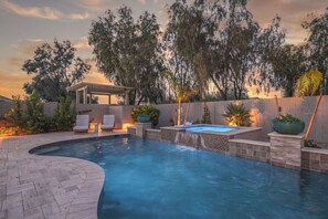 Outdoor pool, a heated pool - Private Heated Pool & Spa - Modern, Spotless Desert Home (San Tan Valley)