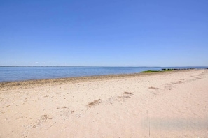 On the beach, sun-loungers, beach towels