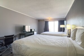 Chambre, 1 grand lit, non-fumeurs | Coffres-forts dans les chambres, Wi-Fi gratuit, draps fournis