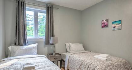 3BR 6Beds 5min Walk distance to Metro, Free Parking, next to Place Bell AC