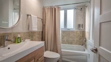 Hair dryer, towels, soap, toilet paper