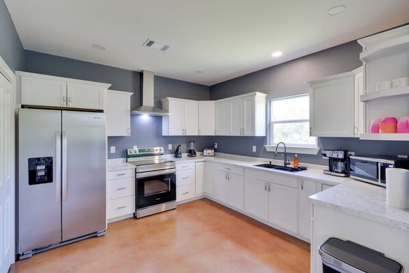 Fridge, microwave, stovetop, coffee/tea maker