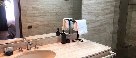 Shower, hair dryer, towels, soap