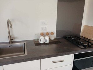 Fridge, microwave, stovetop, cookware/dishes/utensils