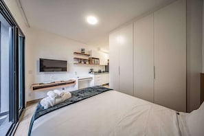 Standard Studio Suite, City View | Hypo-allergenic bedding available, laptop workspace