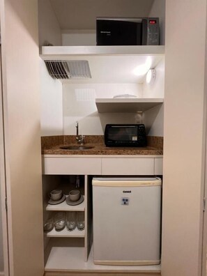 Suite Deluxe | Cocina privada | Frigobar 