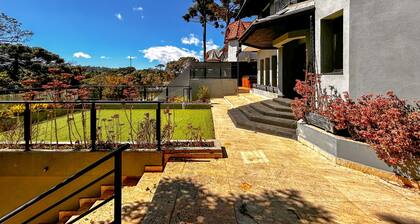 Casa com 4 Su tes Jacuzzi e Lareira Externa