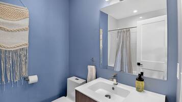 Hair dryer, towels, soap, shampoo