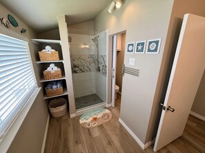 Shower, hair dryer, towels, soap