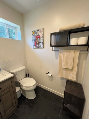 Shower, hair dryer, towels, soap