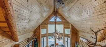The Log Out Lodge, formerly Heaven's Peak, is a 5-bedroom cabin near Midtown