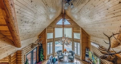 The Log Out Lodge, formerly Heaven's Peak, is a 5-bedroom cabin near Midtown