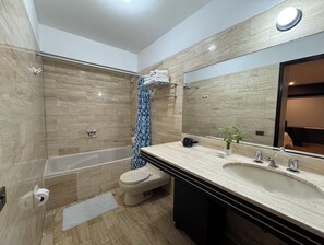 Shower, hair dryer, towels, soap