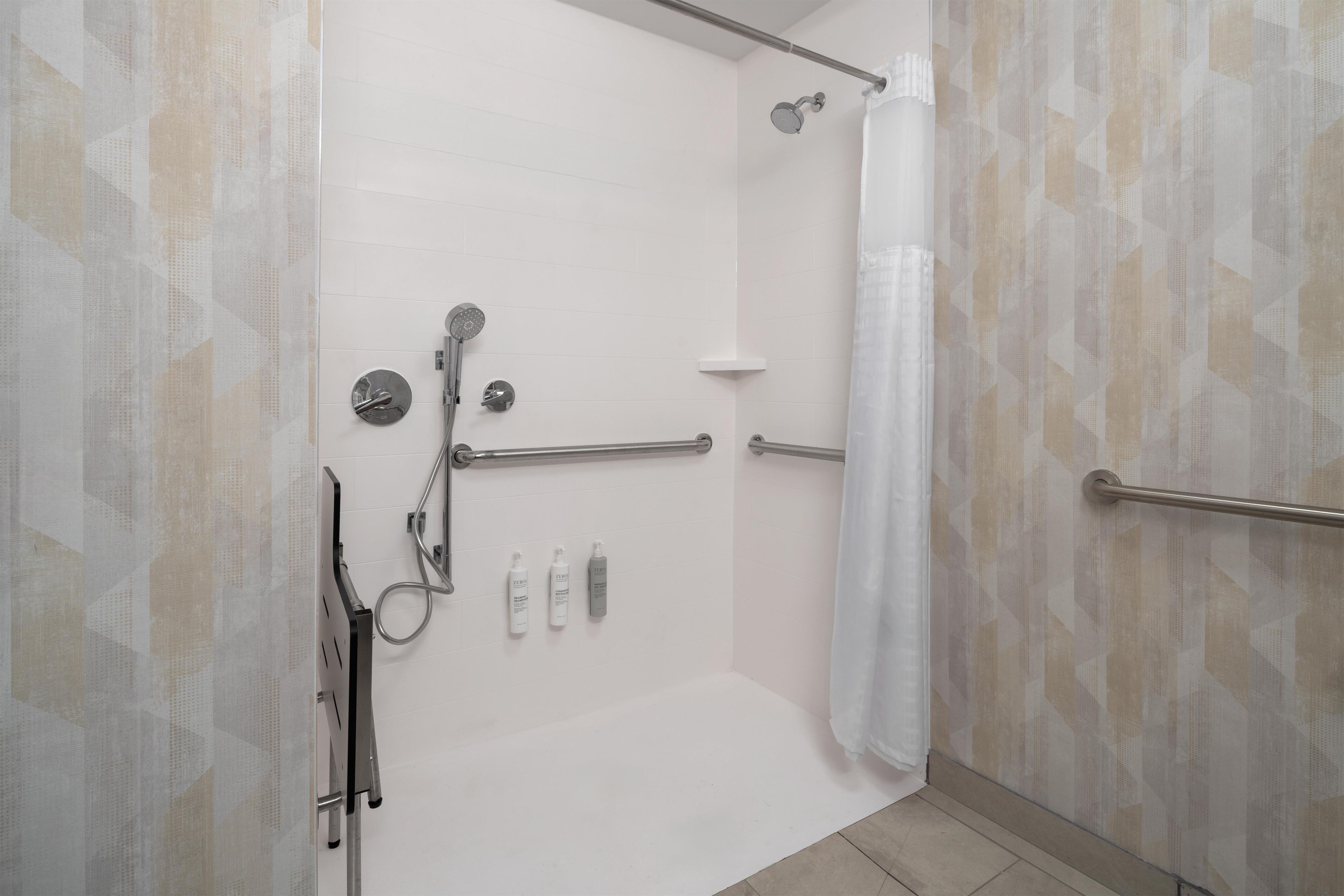 A walk-in shower with a glass door, a handheld showerhead, a handheld showerhead, a handheld showerhead, a handheld showerhead, a handheld showerhead, a handheld showerhead, a handheld showerhead, a handheld showerhead, a handheld showerhead, a handheld showerhead, a handheld showerhead, a handheld showerhead, a handheld showerhead, a handheld showerhead, a handheld showerhead, a handheld showerhead, a handheld showerhead, a handheld showerhead, a handheld showerhead, a handheld showerhead, a handheld showerhead, a handheld showerhead, a handheld showerhead, a handheld showerhead, a handheld showerhead, a handheld showerhead, a handheld showerhead, a handheld showerhead, a handheld showerhead, a handheld showerhead, a handheld showerhead, a handheld showerhead, a handheld showerhead, a handheld showerhead, a handheld showerhead, a handheld showerhead, a handheld showerhead, a handheld shower