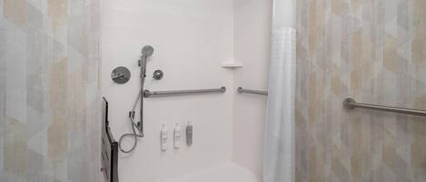 A walk-in shower with a glass door, a handheld showerhead, a handheld showerhead, a handheld showerhead, a handheld showerhead, a handheld showerhead, a handheld showerhead, a handheld showerhead, a handheld showerhead, a handheld showerhead, a handheld showerhead, a handheld showerhead, a handheld showerhead, a handheld showerhead, a handheld showerhead, a handheld showerhead, a handheld showerhead, a handheld showerhead, a handheld showerhead, a handheld showerhead, a handheld showerhead, a handheld showerhead, a handheld showerhead, a handheld showerhead, a handheld showerhead, a handheld showerhead, a handheld showerhead, a handheld showerhead, a handheld showerhead, a handheld showerhead, a handheld showerhead, a handheld showerhead, a handheld showerhead, a handheld showerhead, a handheld showerhead, a handheld showerhead, a handheld showerhead, a handheld showerhead, a handheld shower