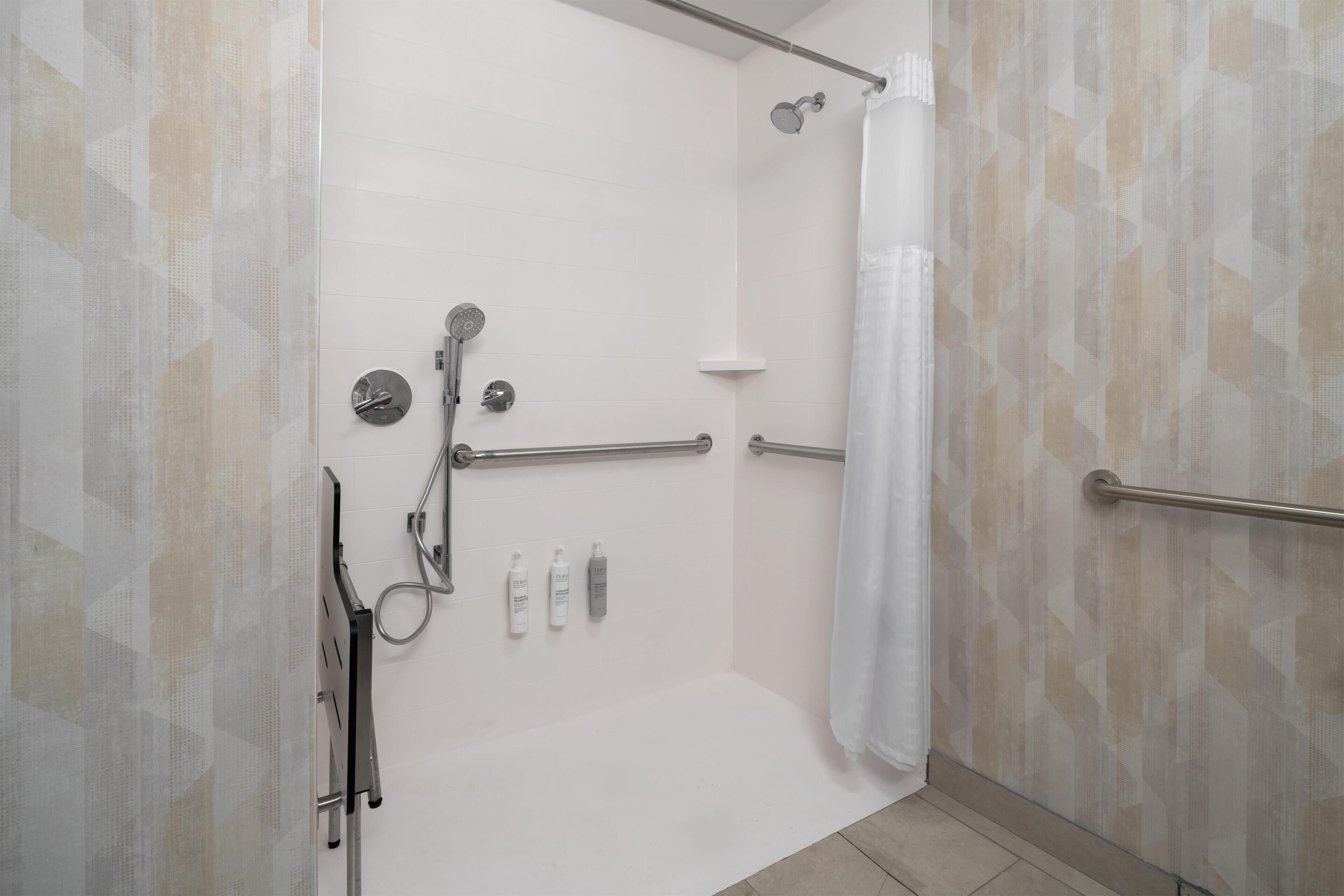 A walk-in shower with a glass door, a handheld showerhead, a handheld showerhead, a handheld showerhead, a handheld showerhead, a handheld showerhead, a handheld showerhead, a handheld showerhead, a handheld showerhead, a handheld showerhead, a handheld showerhead, a handheld showerhead, a handheld showerhead, a handheld showerhead, a handheld showerhead, a handheld showerhead, a handheld showerhead, a handheld showerhead, a handheld showerhead, a handheld showerhead, a handheld showerhead, a handheld showerhead, a handheld showerhead, a handheld showerhead, a handheld showerhead, a handheld showerhead, a handheld showerhead, a handheld showerhead, a handheld showerhead, a handheld showerhead, a handheld showerhead, a handheld showerhead, a handheld showerhead, a handheld showerhead, a handheld showerhead, a handheld showerhead, a handheld showerhead, a handheld showerhead, a handheld shower