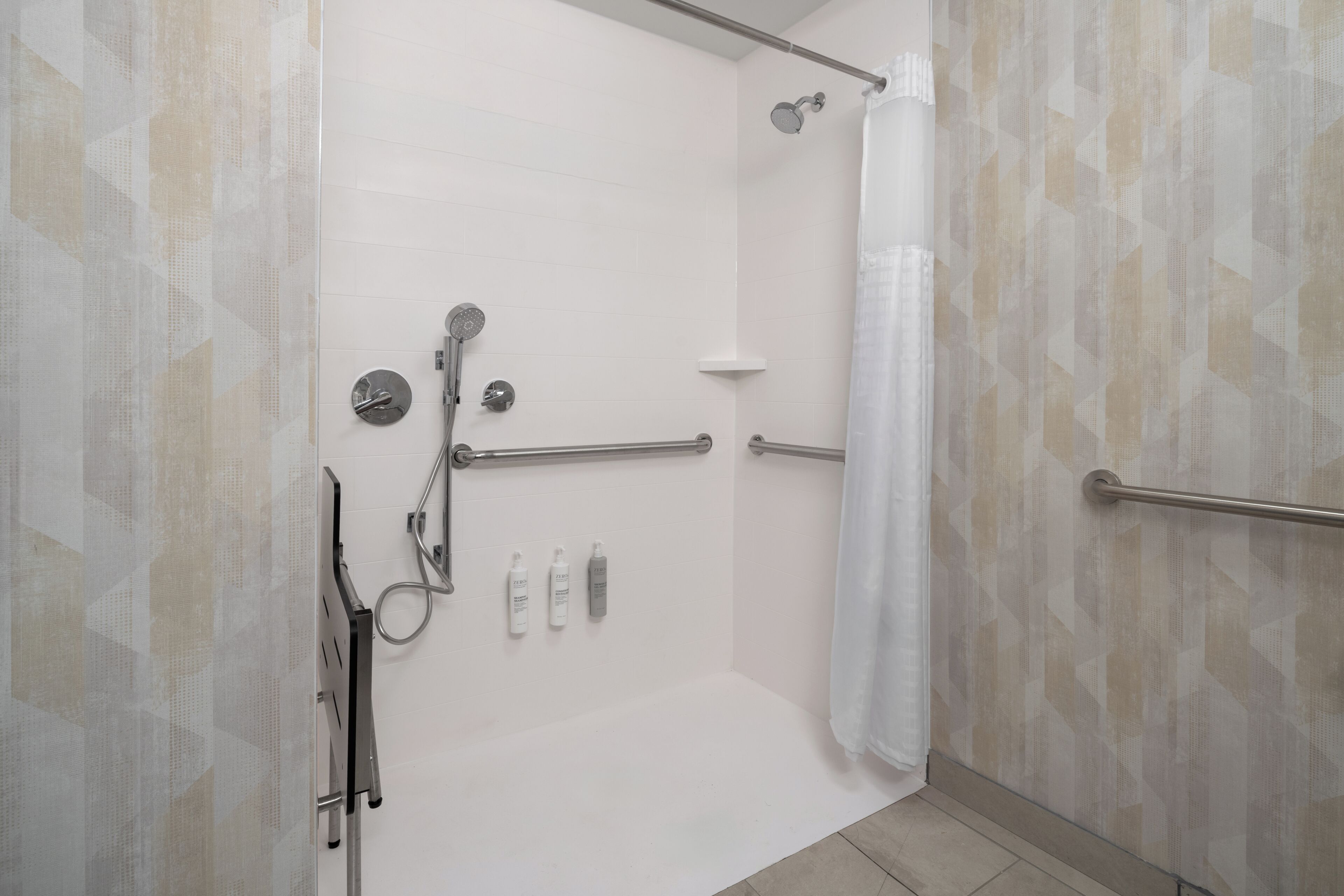 A walk-in shower with a glass door, a showerhead, a handheld shower, a handheld shower attachment, a handheld shower attachment, a handheld shower attachment, a handheld shower attachment, a handheld shower attachment, a handheld shower attachment, a handheld shower attachment, a handheld shower attachment, a handheld shower attachment, a handheld shower attachment, a handheld shower attachment, a handheld shower attachment, a handheld shower attachment, a handheld shower attachment, a handheld shower attachment, a handheld shower attachment, a handheld shower attachment, a handheld shower attachment, a handheld shower attachment, a handheld shower attachment, a handheld shower attachment, a handheld shower attachment, a handheld shower attachment, a handheld shower attachment, a handheld shower attachment, a handheld shower attachment, a handheld shower attachment, a handheld shower attachment, a handheld shower attachment, a handheld shower attachment, a handheld shower attachment, a handheld shower attachment, a handheld shower attachment, a handheld shower attachment, a handheld shower attachment, a handheld shower attachment,