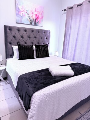 1 غرفة نوم ومكواة/لوح كي وواي فاي وملاءات أسرّة