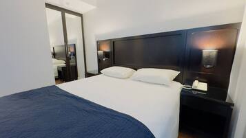 Executive Double Room | Blackout drapes, iron/ironing board, free WiFi