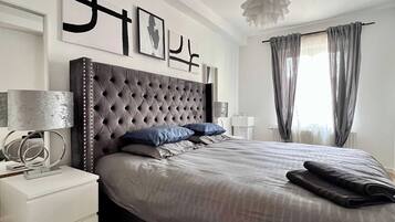 1 chambre, fer et planche à repasser, draps fournis