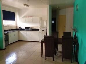 Fridge, microwave, oven, cookware/dishes/utensils