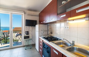 Refrigerador, horno, placa de cocina