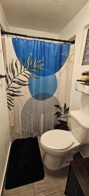 Shower, towels, soap, shampoo