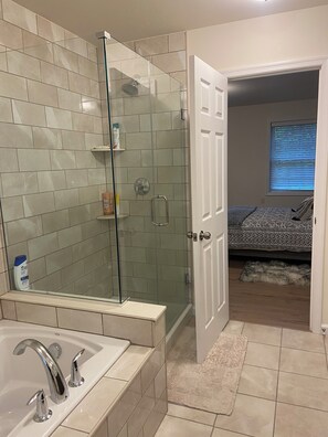 Shower, towels, soap, toilet paper