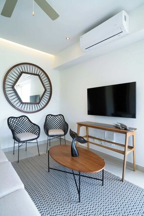 Leilighet, flere senger, adgang til basseng, havutsikt (Pavilion 305) | Oppholdsområde