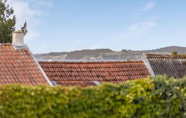 A coastal view with terracotta roofs and a distant hill. - 2 bedroom gorgeous home in Sønderborg (Sønderborg)