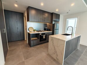 Fridge, microwave, oven, stovetop - Charming 2 bedroom APT overlooking Accor Stadium (Lidcombe)