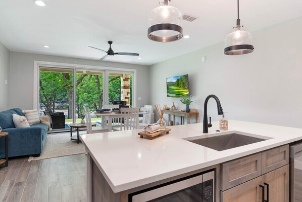 Open concept living/kitchen with Guadalupe River views