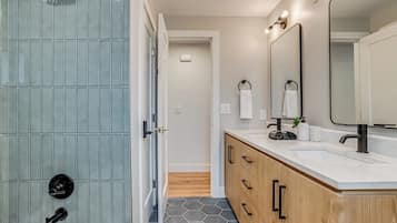 Shower, eco-friendly toiletries, hair dryer, towels