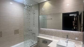 Separate bathtub and shower, hair dryer, slippers, towels