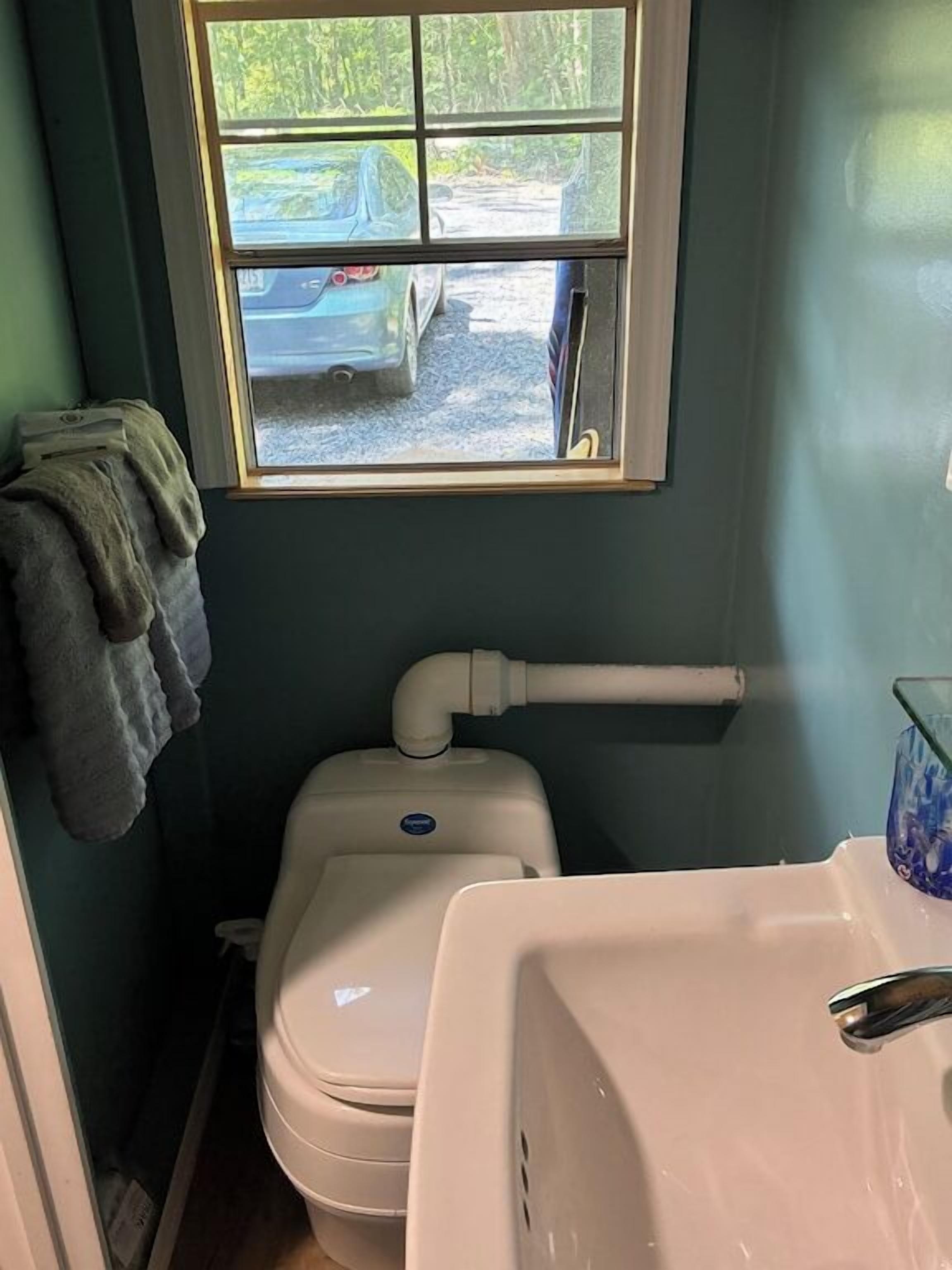 Shower, towels, soap, toilet paper