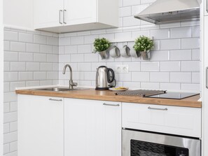 Fridge, microwave, coffee/tea maker, toaster