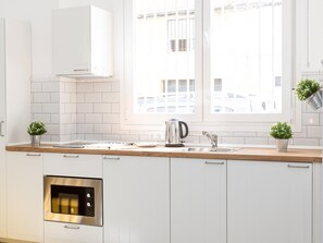 Fridge, microwave, coffee/tea maker, toaster