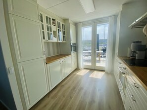 Dishwasher, electric kettle, high chair, dining tables