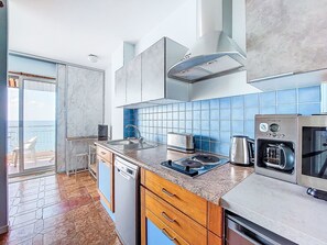 Fridge, microwave, cookware/dishes/utensils