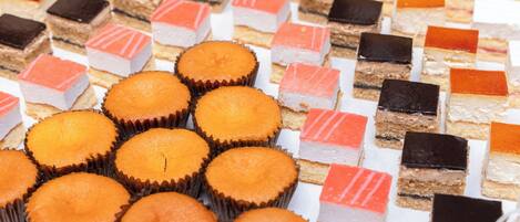A variety of desserts arranged on a table.