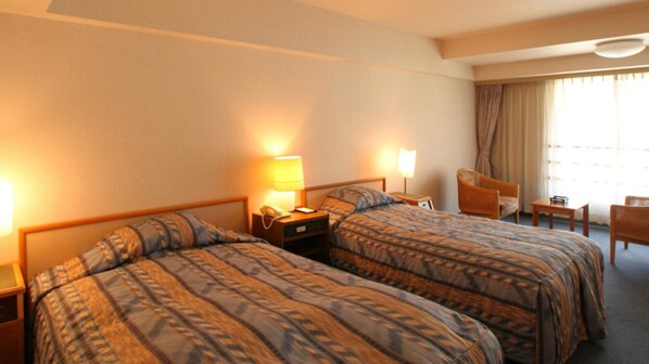 Chambre avec lits jumeaux, non-fumeur, salle de bains commune (Standard) | AccĂšs au Wi-Fi (inclus)