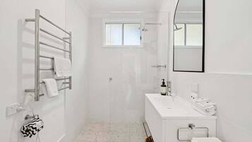 Hair dryer, towels, soap, shampoo