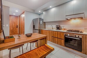 Deluxe Apartment, Balcony, Garden View | Private kitchen