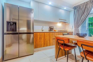 Deluxe Apartment, Balcony, Garden View | Private kitchen | Espresso maker, coffee/tea maker, electric kettle