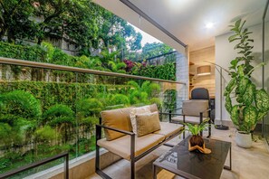 Deluxe Apartment, Balcony, Garden View | Terrace/patio