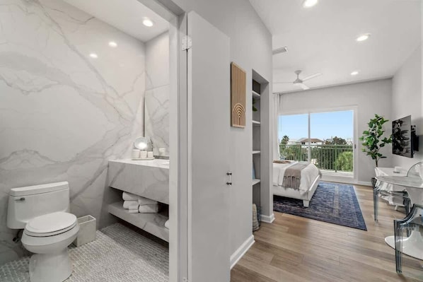 Shower, hair dryer, towels