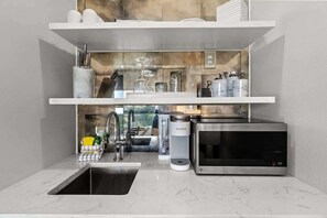 Microwave, dishwasher, coffee/tea maker, toaster
